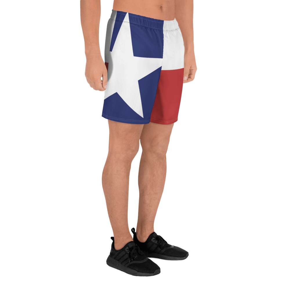 Texas flag pattern shorts on male model below torso, from right