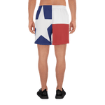 Texas flag pattern shorts on male model below torso, from rear