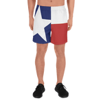Texas flag pattern shorts on male model below torso, from front