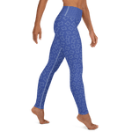 Texas shapes on blue yoga pants, worn by model from torso down, right side