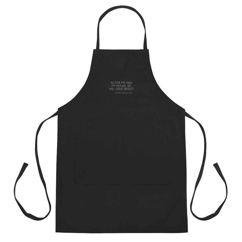 Black apron with embroidered words 'AS FOR ME AND MY HOUSE, WE WILL SERVE BRISKET'.