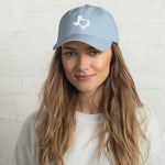 heart in Texas on light blue hat on female model with brown hair