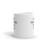 coffee mug with parts of written Texas design on each side shown