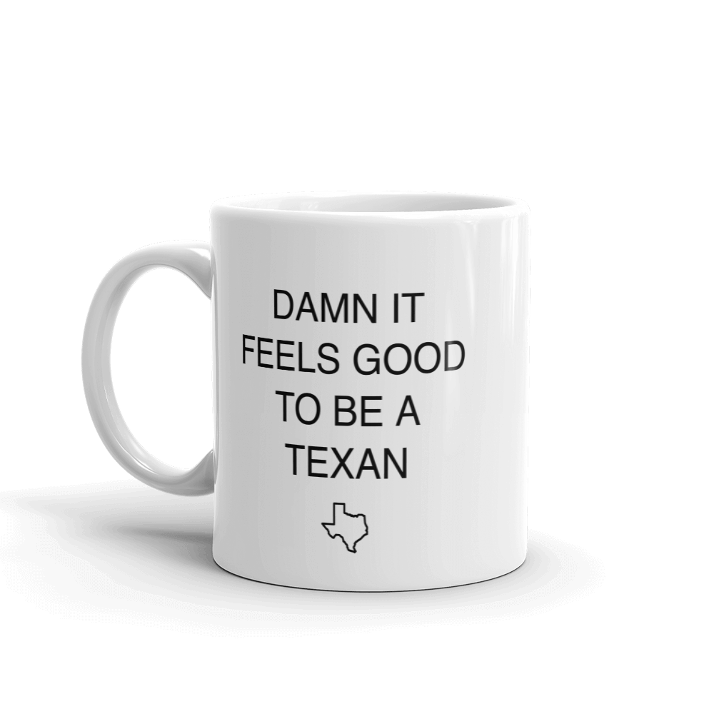 White coffee mug says 'DAMN IT FEELS GOOD TO BE A TEXAN' with Texas outline