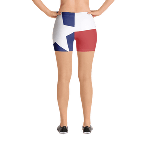 Texas flag pattern shorts on a model below torso, from rear