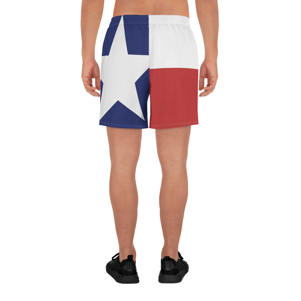 Texas flag pattern shorts on male model below torso, from rear