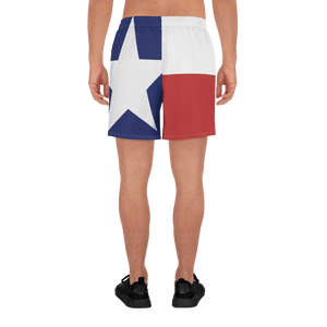 Texas flag pattern shorts on male model below torso, from rear